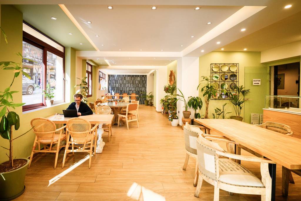 Lounge lobby with rattan chairs and reception desk